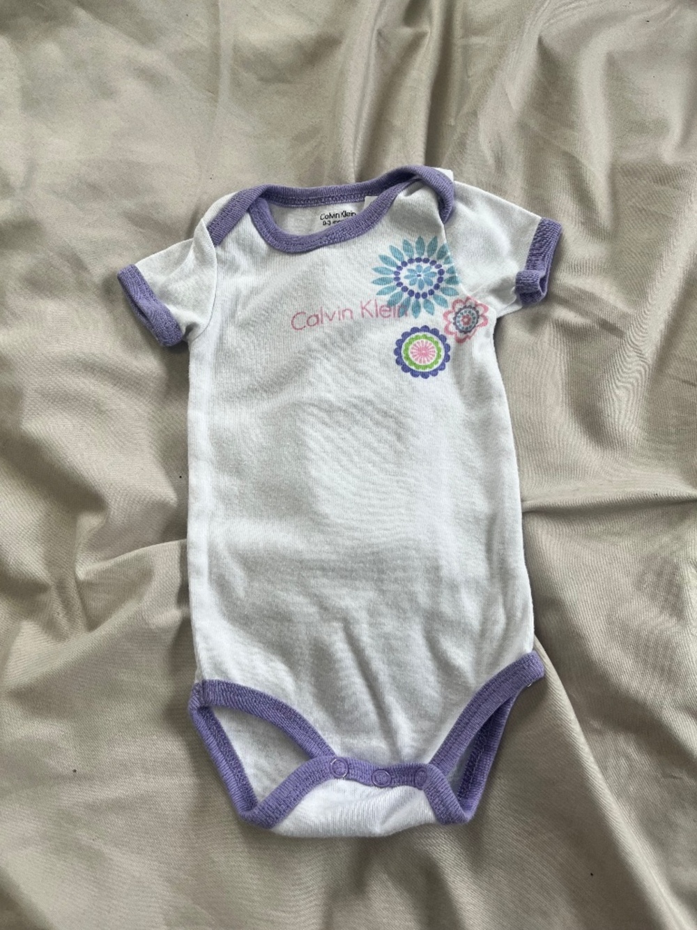 3 for $10 Calvin Klein baby onesie